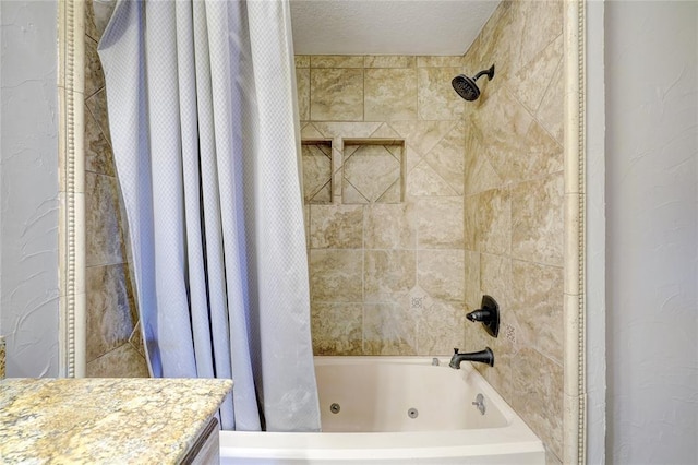 bathroom with shower / bath combination with curtain and vanity