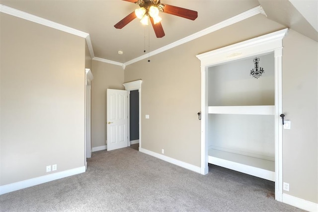 unfurnished bedroom featuring ornamental molding, carpet, and ceiling fan