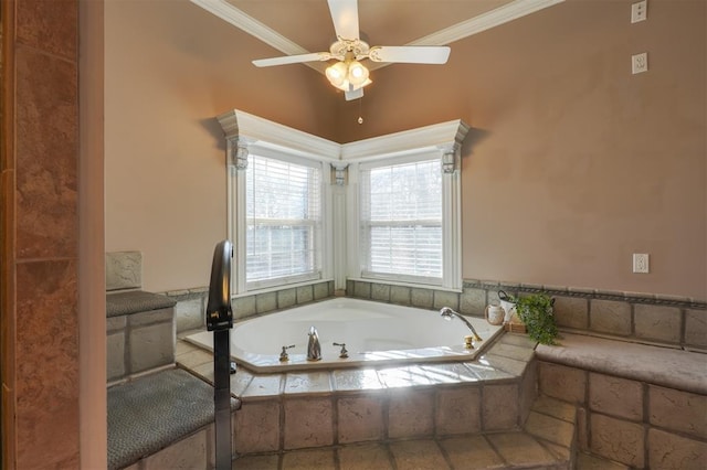 bathroom featuring a relaxing tiled tub, ornamental molding, and ceiling fan