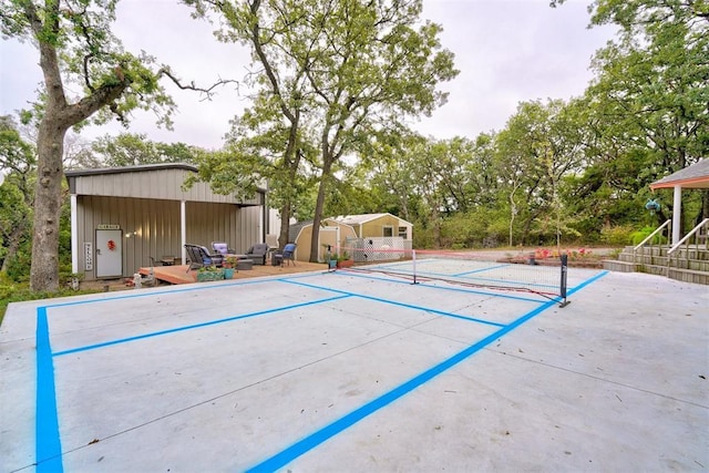 view of community with a storage shed