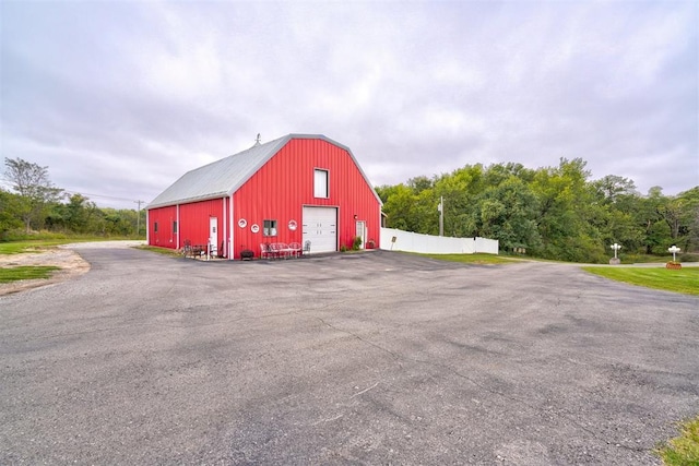 view of outdoor structure with a garage