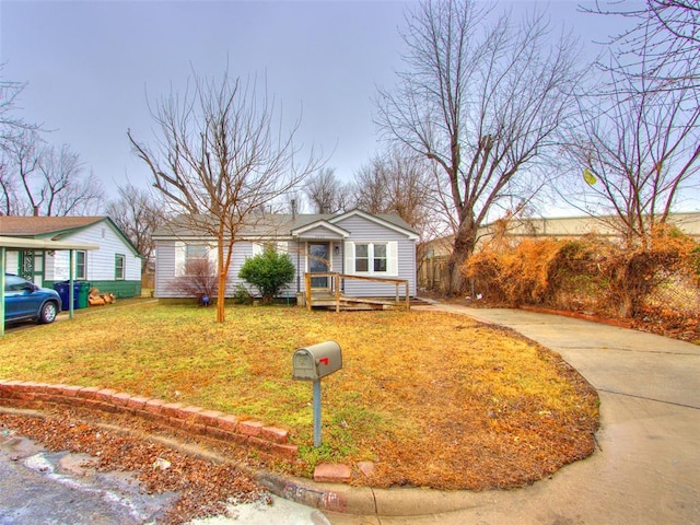 view of front of home with a front yard