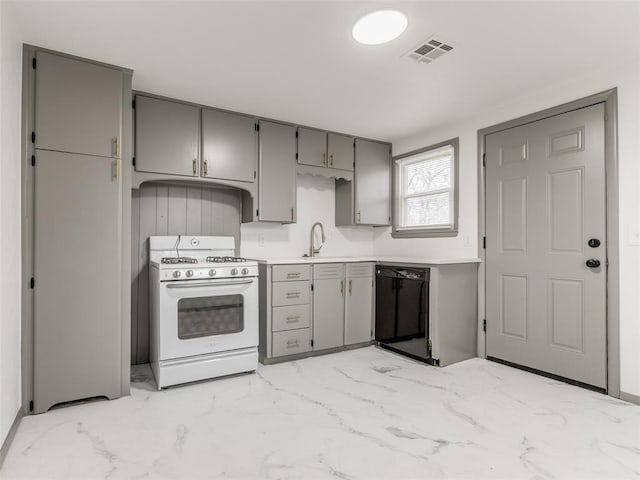 kitchen featuring gray cabinetry, sink, gas range gas stove, and black dishwasher