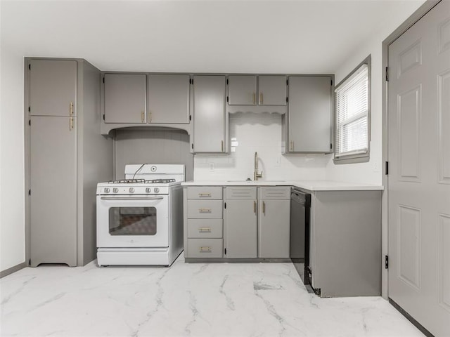 kitchen featuring sink, gray cabinetry, dishwasher, white gas range oven, and backsplash