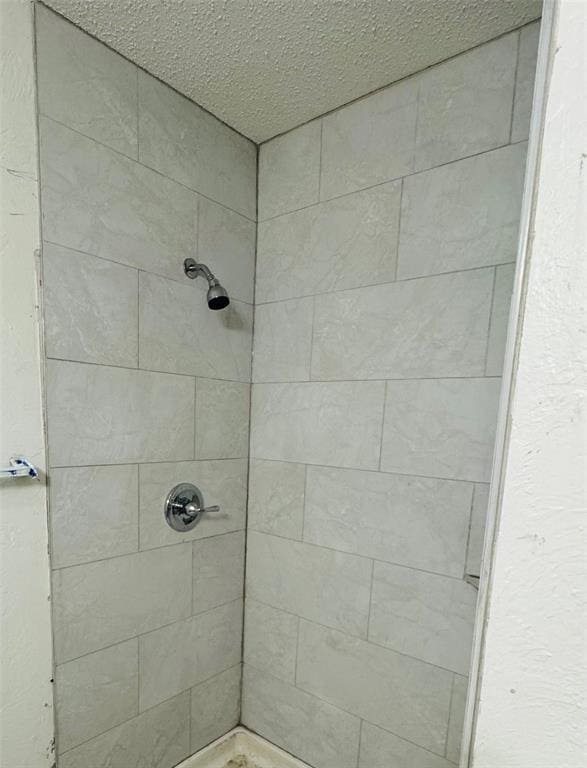 bathroom featuring a stall shower