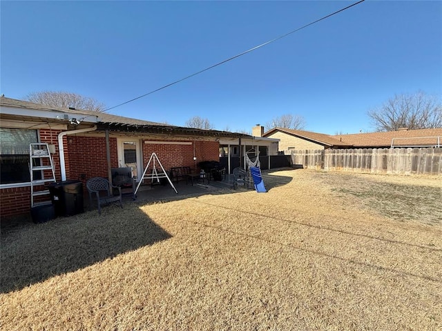 back of house with a patio area