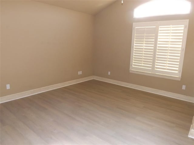 unfurnished room featuring light hardwood / wood-style floors