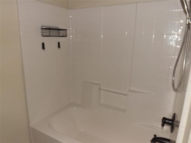 bathroom with shower / bath combination