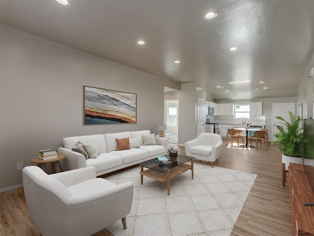 502 E Hudson St, Lexington, OK 73051 - living area featuring recessed lighting, light wood-style flooring, and baseboards