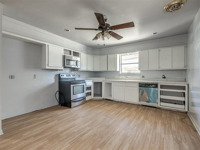 kitchen with ceiling fan, appliances with stainless steel finishes, light wood-type flooring, and white cabinets