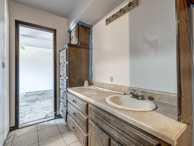 bathroom with vanity and tile patterned floors