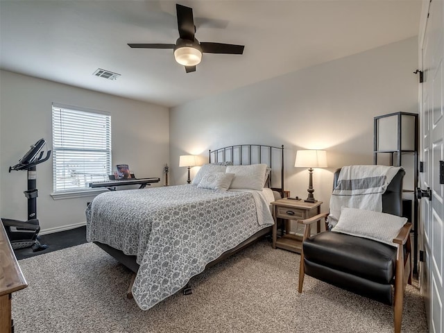 bedroom with ceiling fan and carpet flooring