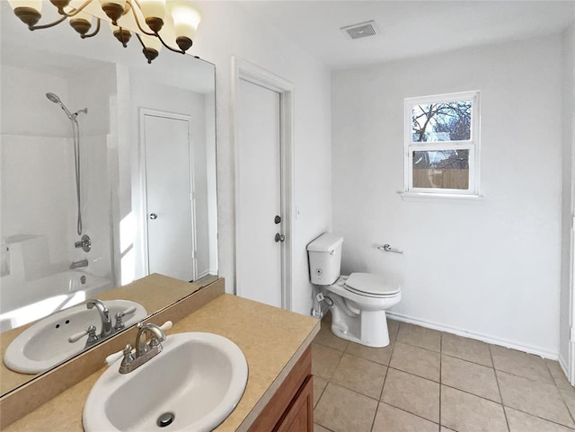 full bathroom with washtub / shower combination, vanity, toilet, and tile patterned flooring