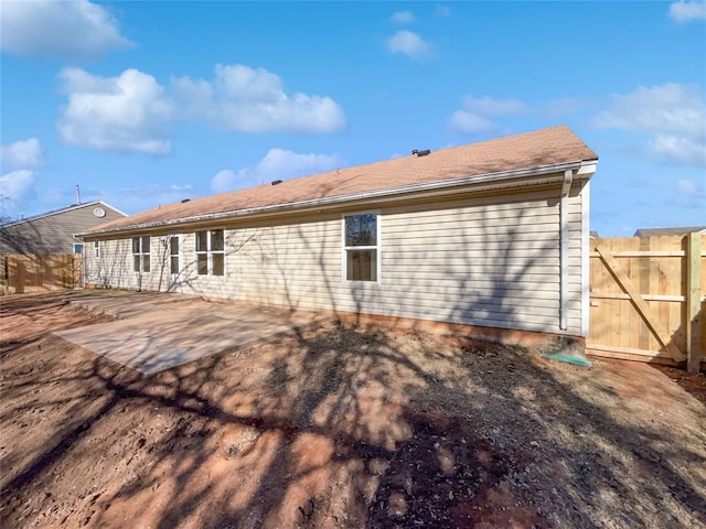 rear view of house with a patio