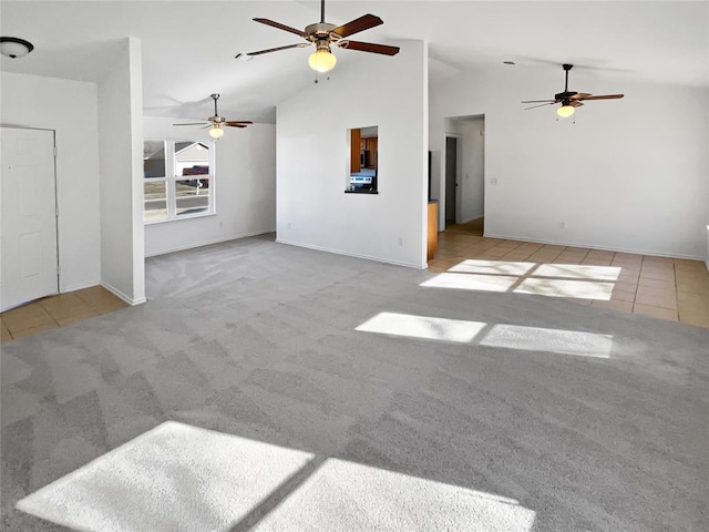 unfurnished living room featuring lofted ceiling and light carpet