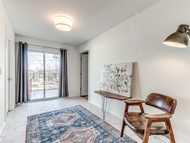 sitting room featuring light tile patterned floors