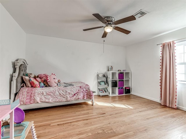 bedroom featuring ceiling fan and light wood-type flooring