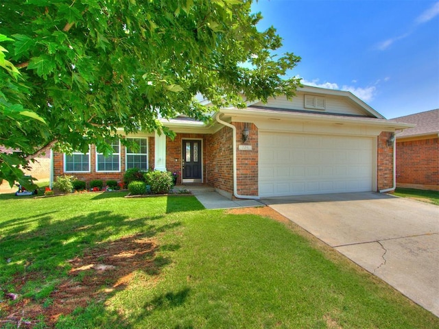 view of front of home featuring a garage and a front lawn