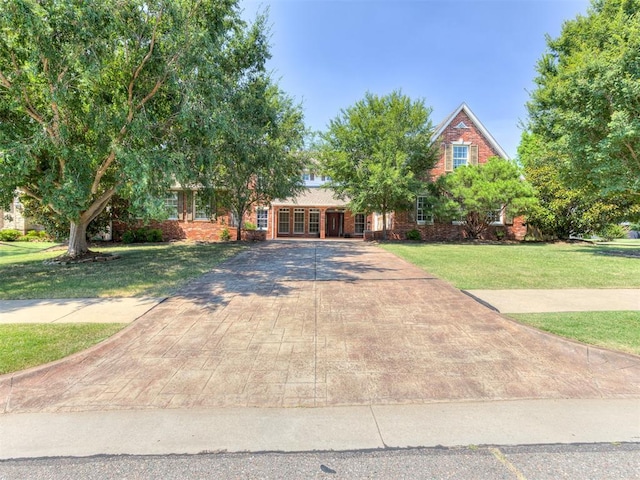 view of front of house with a front lawn