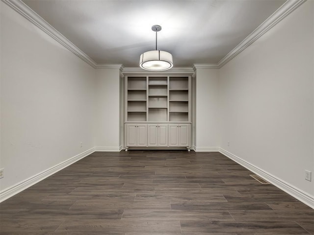 unfurnished dining area with crown molding