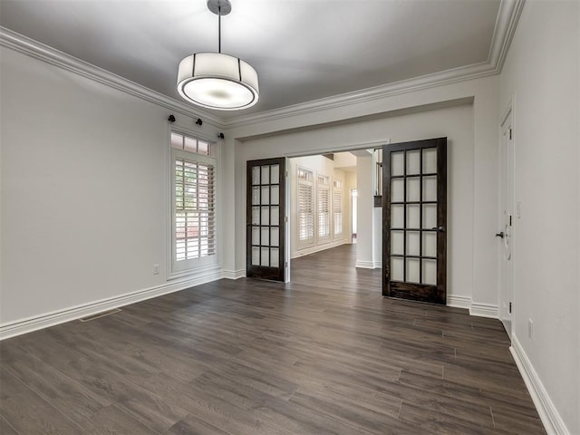 unfurnished room with dark hardwood / wood-style flooring and crown molding