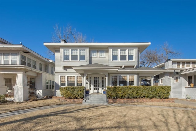 view of front of property with a front lawn