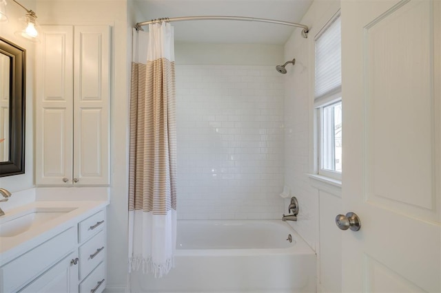 bathroom with vanity and shower / bath combo