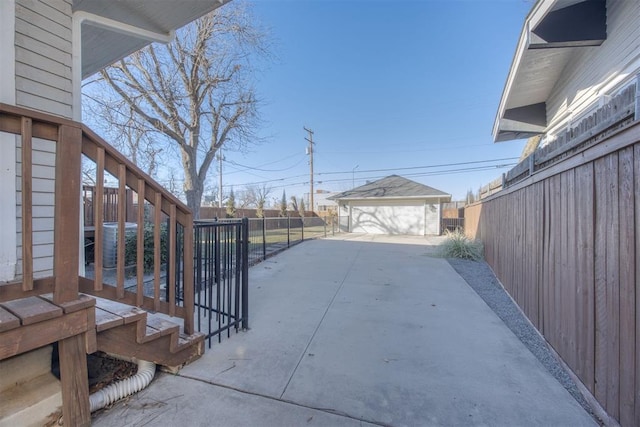 exterior space with a garage and an outdoor structure