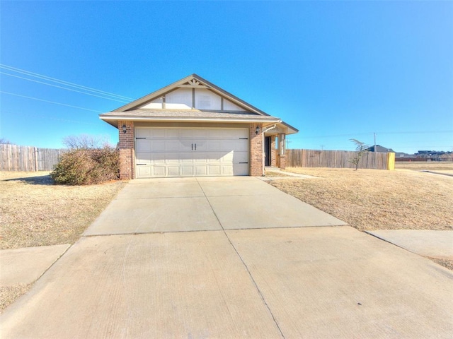 ranch-style house featuring a garage