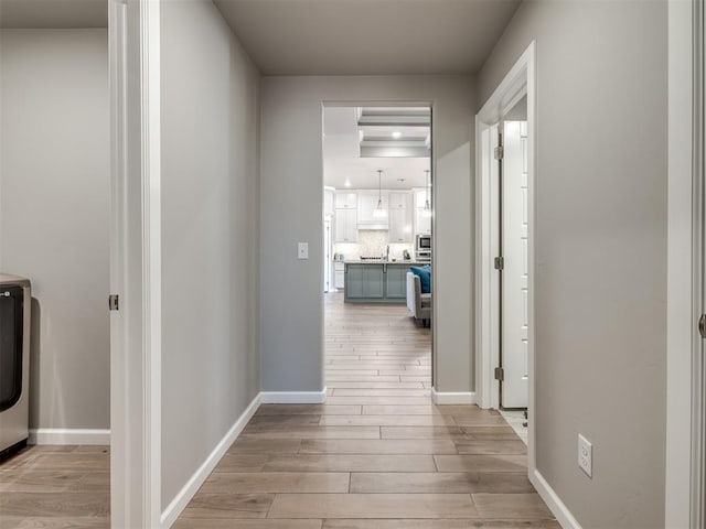 corridor featuring light wood-type flooring