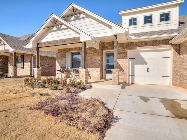 craftsman-style home with a garage and a porch