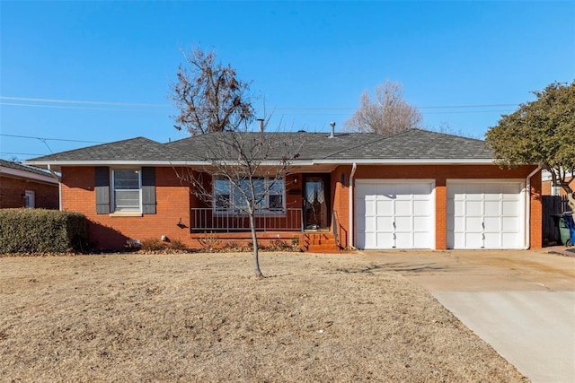 ranch-style house featuring a garage