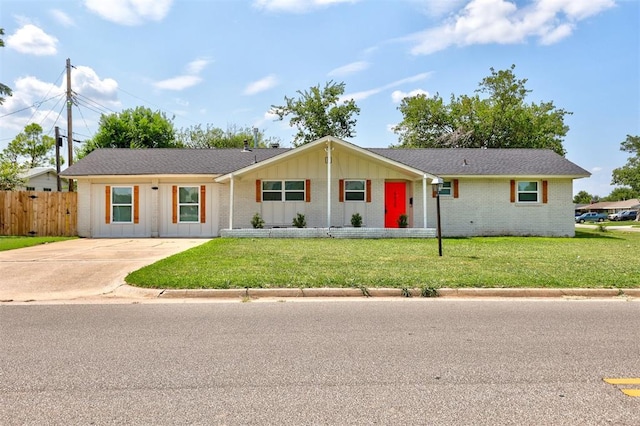 ranch-style home with a front yard