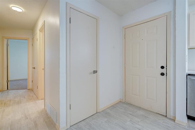 hall featuring light hardwood / wood-style flooring