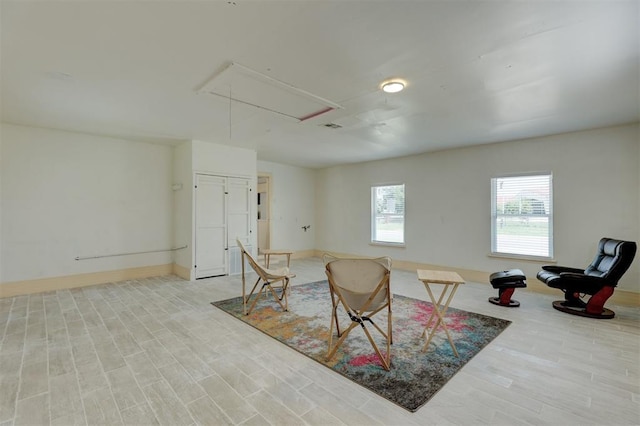 sitting room featuring light wood-type flooring