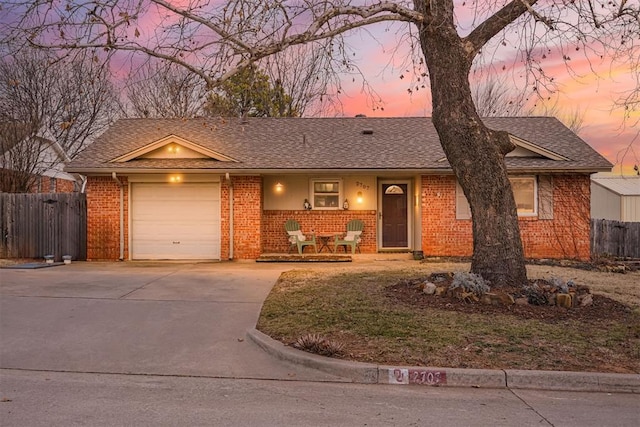 ranch-style home with a garage