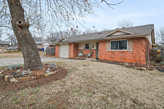 ranch-style home featuring a garage