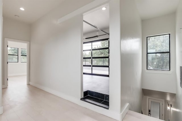 hallway with plenty of natural light