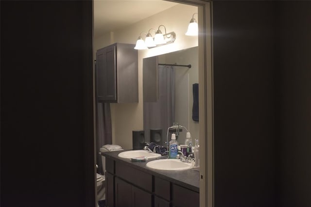 bathroom with vanity and walk in shower