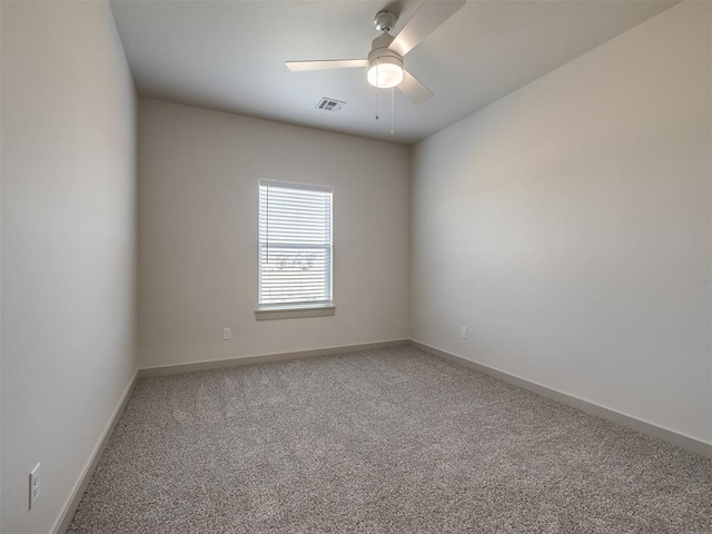 unfurnished room featuring carpet and ceiling fan