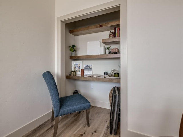 sitting room with light hardwood / wood-style floors