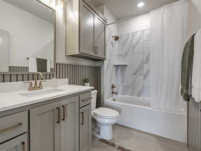 full bathroom with vanity, shower / bathtub combination with curtain, tile patterned floors, and toilet