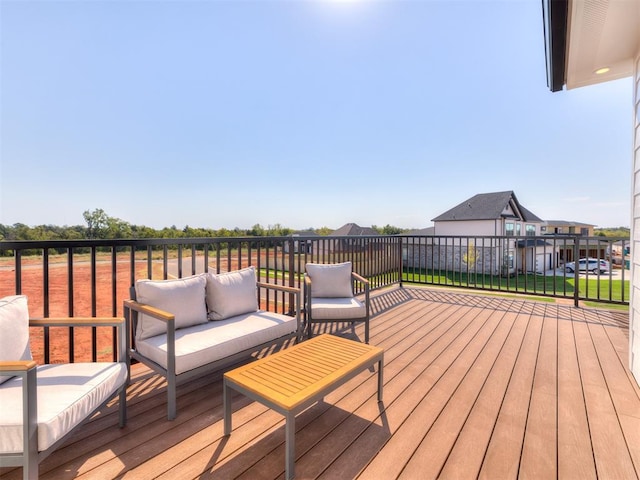 wooden deck with an outdoor hangout area