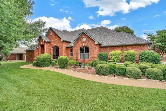 view of property featuring a front yard