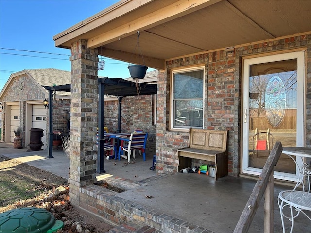 view of patio / terrace with a garage