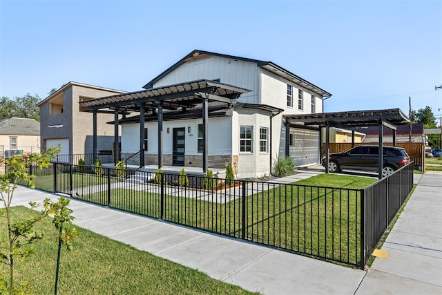 exterior space with a front yard and a carport