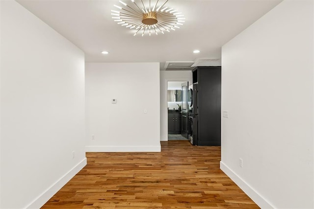 empty room with wood-type flooring