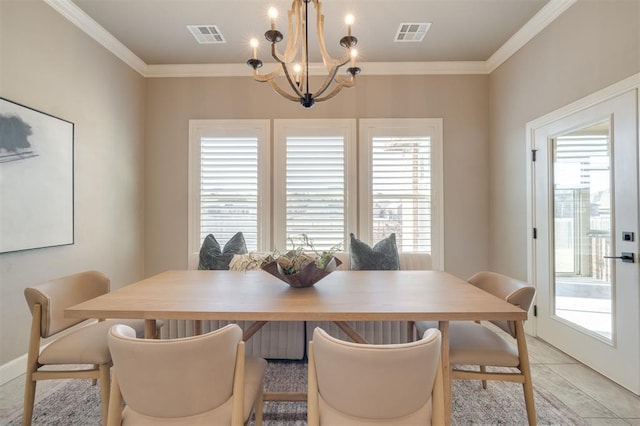 dining room featuring breakfast area, light tile patterned floors, a wealth of natural light, and a chandelier