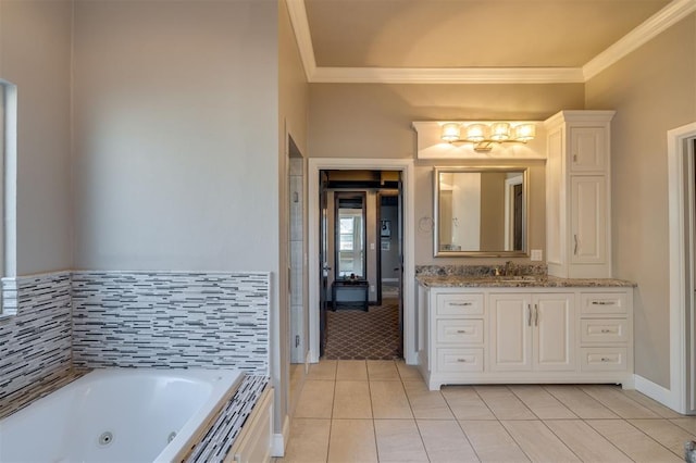 bathroom featuring vanity, crown molding, tile patterned floors, and a bathing tub