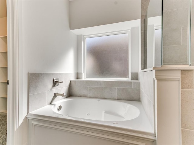 bathroom featuring a tub to relax in